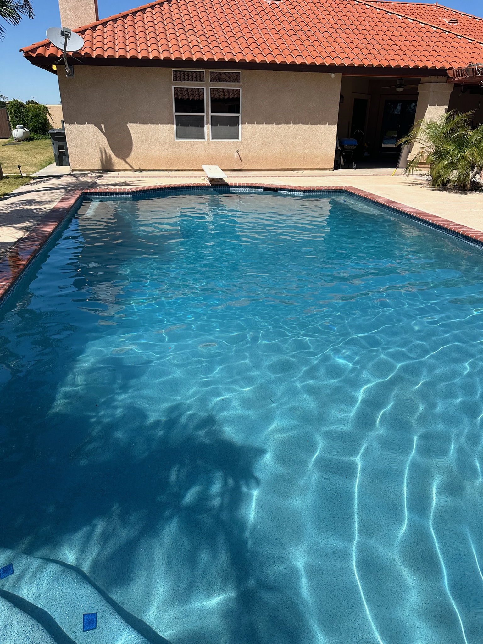 Clear blue swimming pool