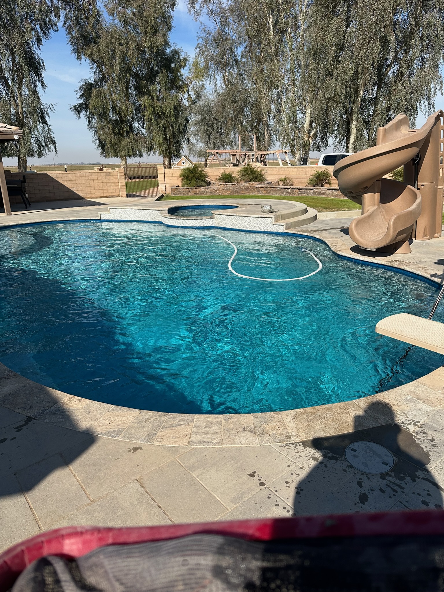 Family pool with slide and spa