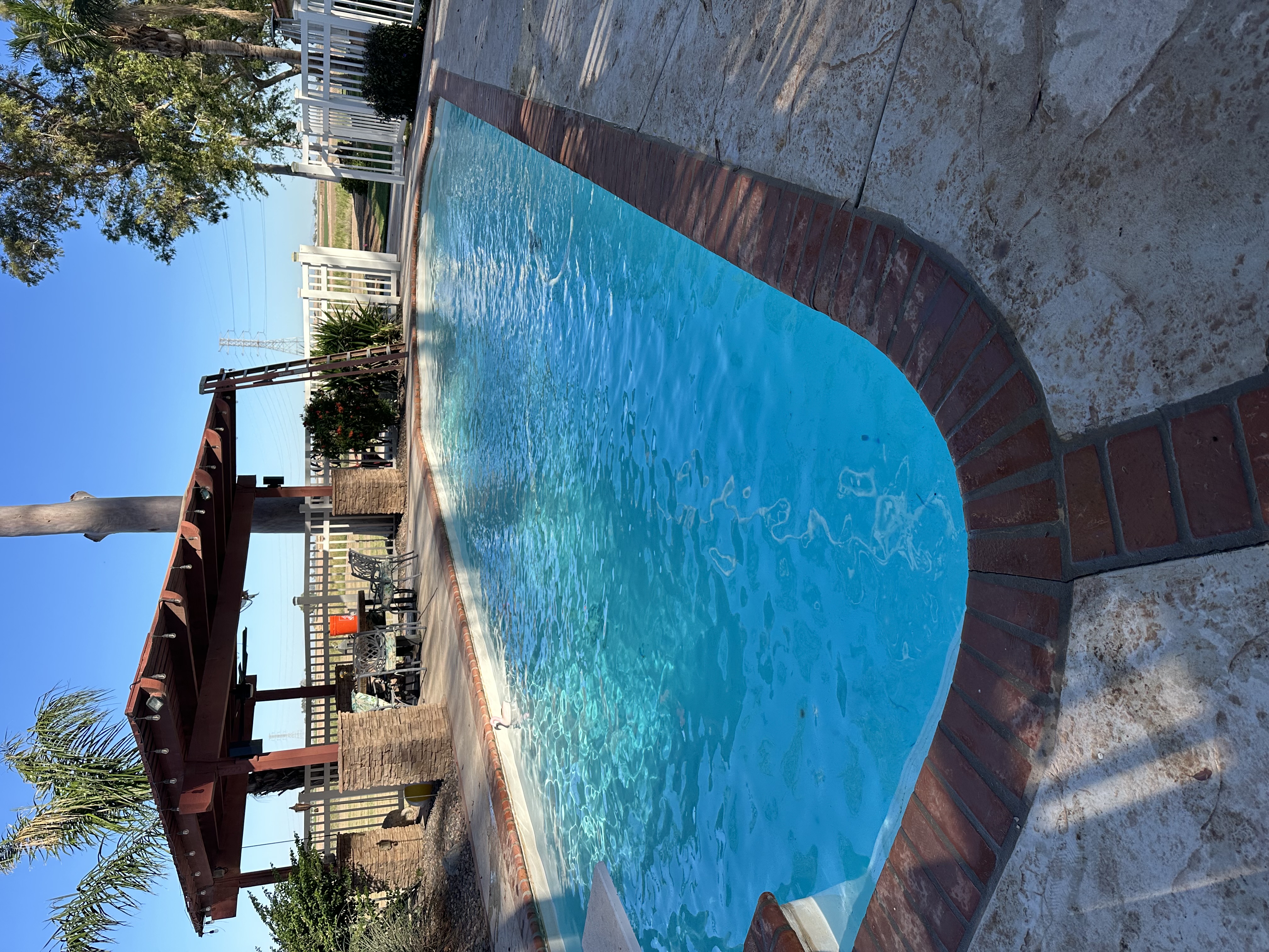 Same pool after cleaning, with clear blue water
