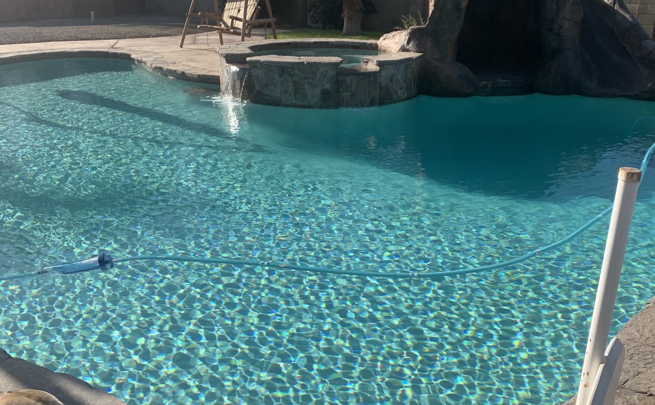 Pool after cleaning, with clear blue water